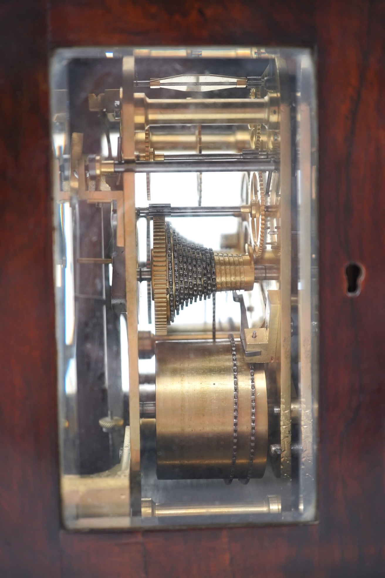 A William IV four glass rosewood double fusee library clock by James Muirhead